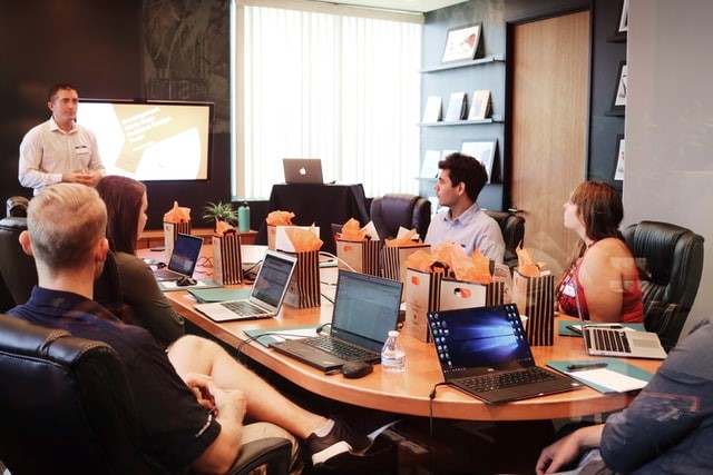 People sitting in a meeting.