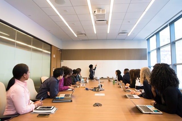 People sitting in a meeting.